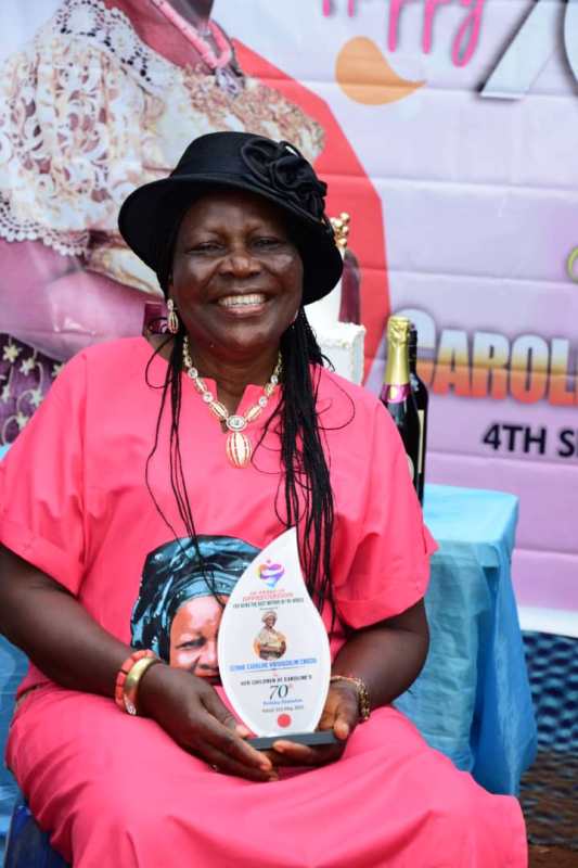 Birthday Gift: 70-Year Old Woman Receives Award Plaque From Her Children